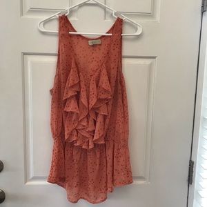 Sheer orange sleeveless blouse